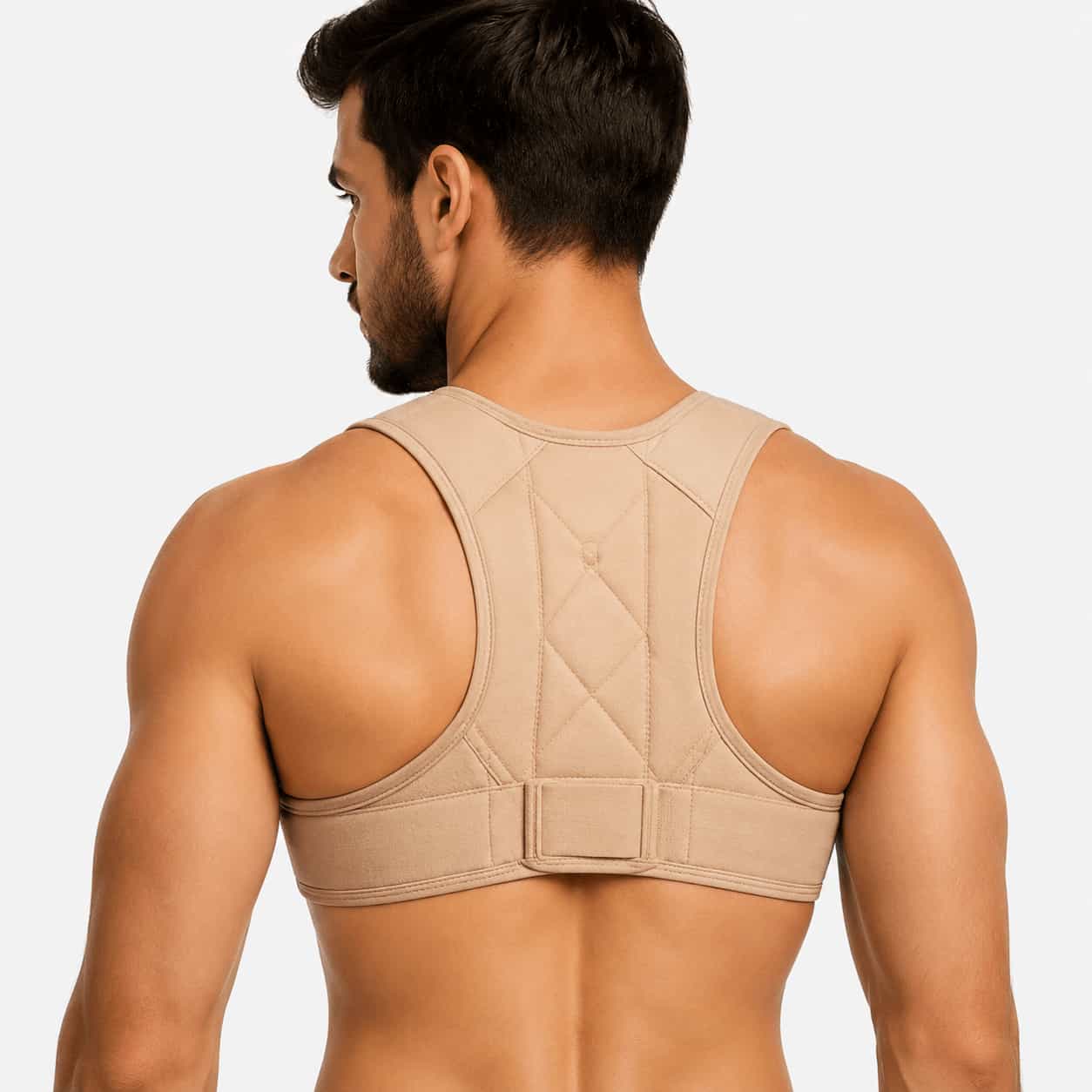 Close-up of an Aligna posture corrector worn on a man's back